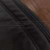 Black double-stitching on Black leather