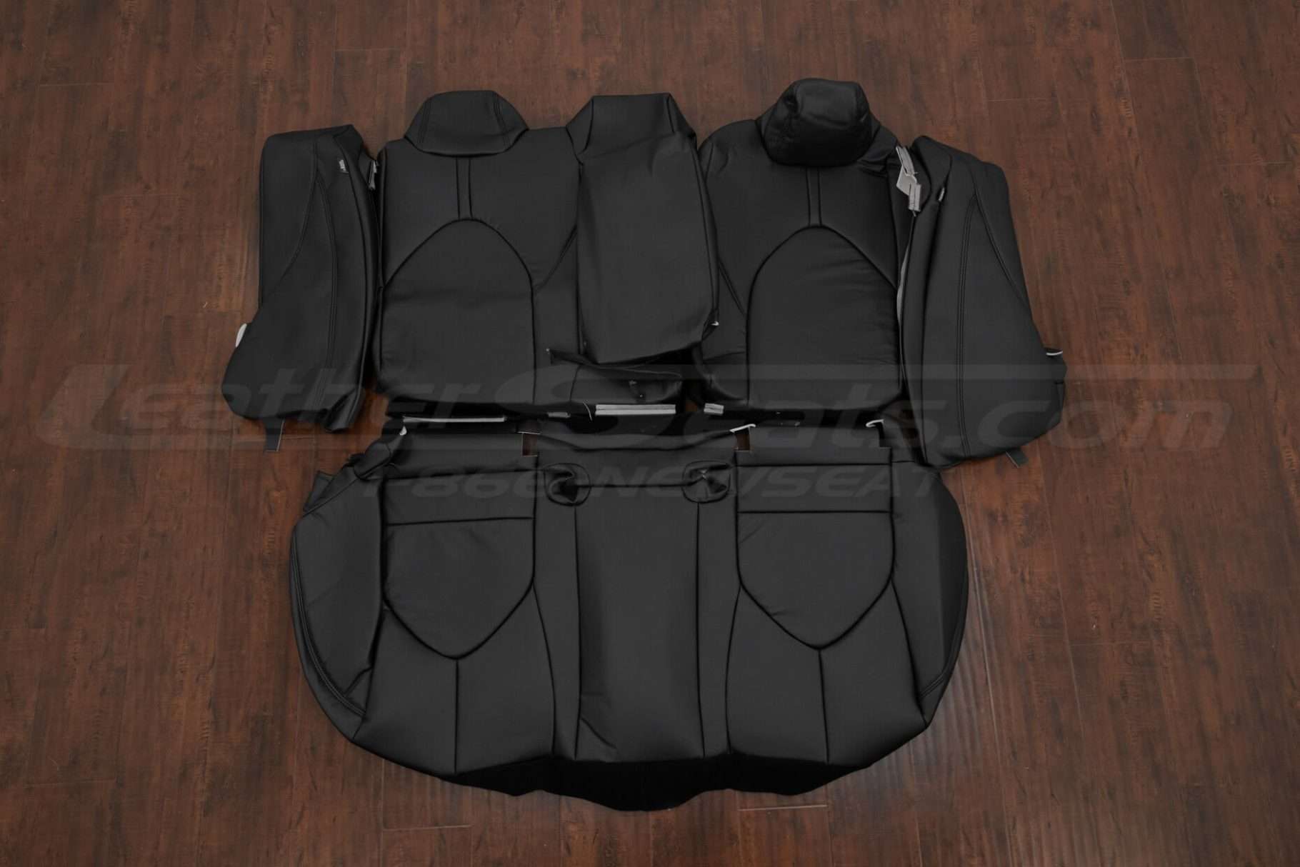 Toyota Camry rear seat upholstery with armrests and bolsters in black