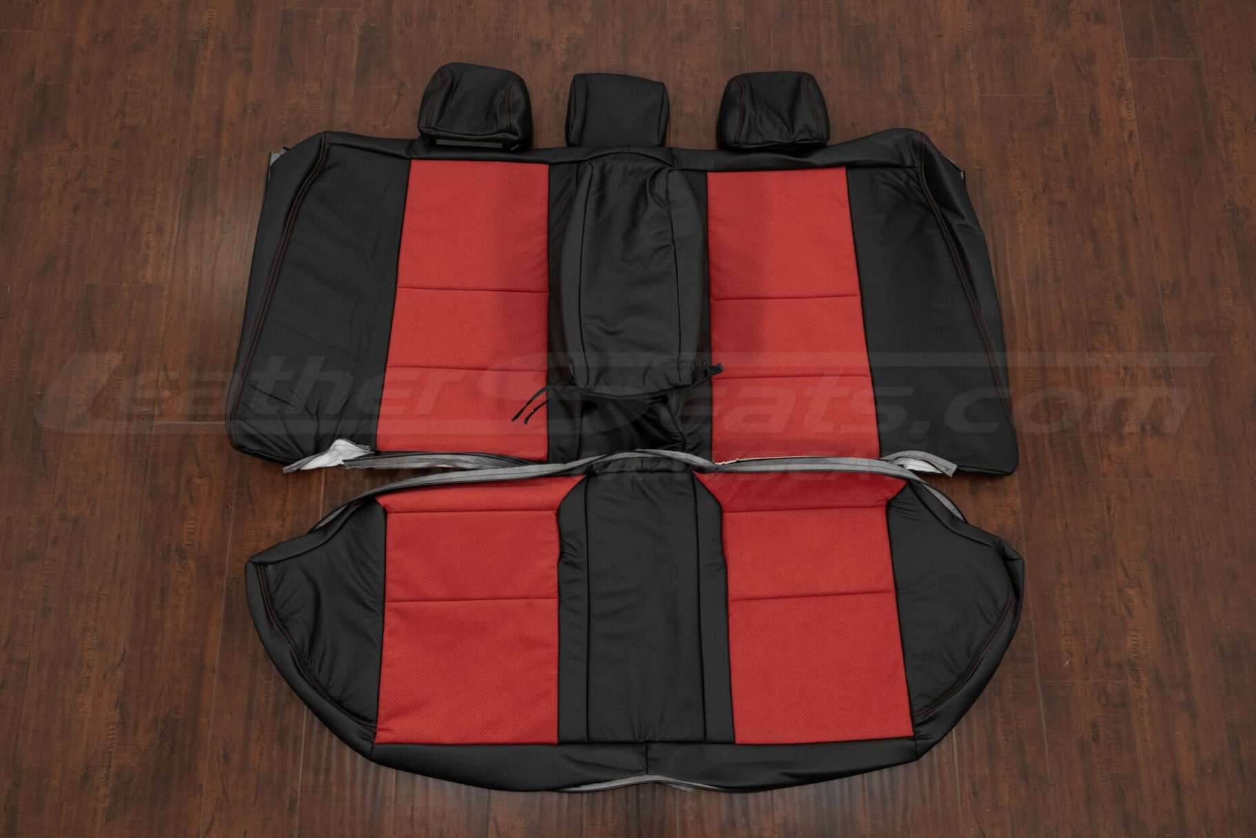 Lexus IS300 sedan rear backrest upholstery with armrest in Black leather with Red Synthetic Suede