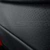 Perofrated Inserts on Black leather close-up
