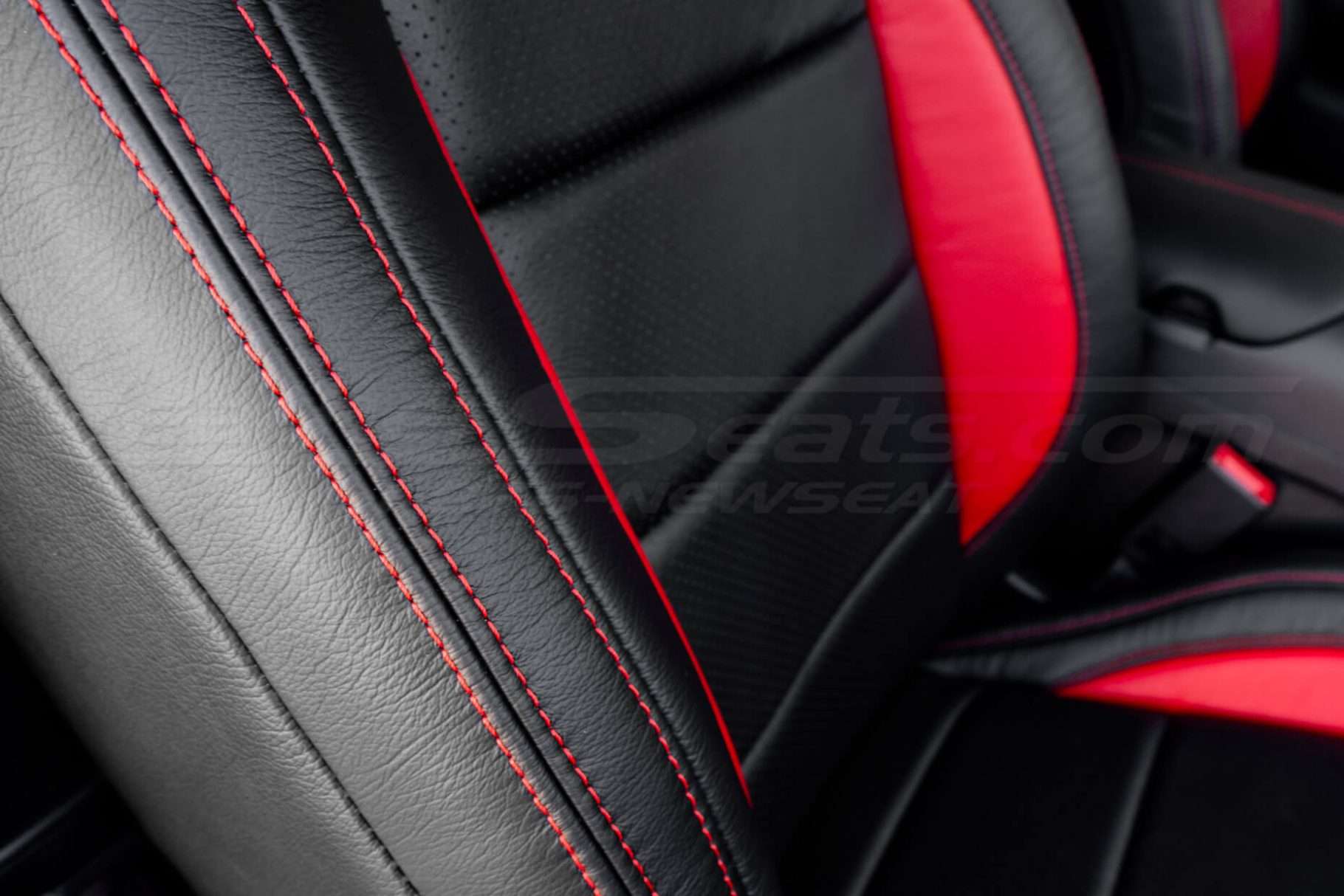 Contrasting Bright Red double-stitching on Black leather