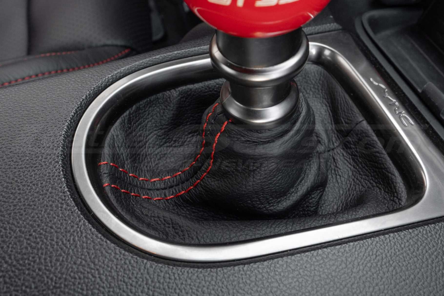 Passenger side view of manual shift boot upholstery for ford mustang