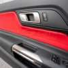 Leather texture close-up of Bright Red and Black Ford Mustang Door Insert