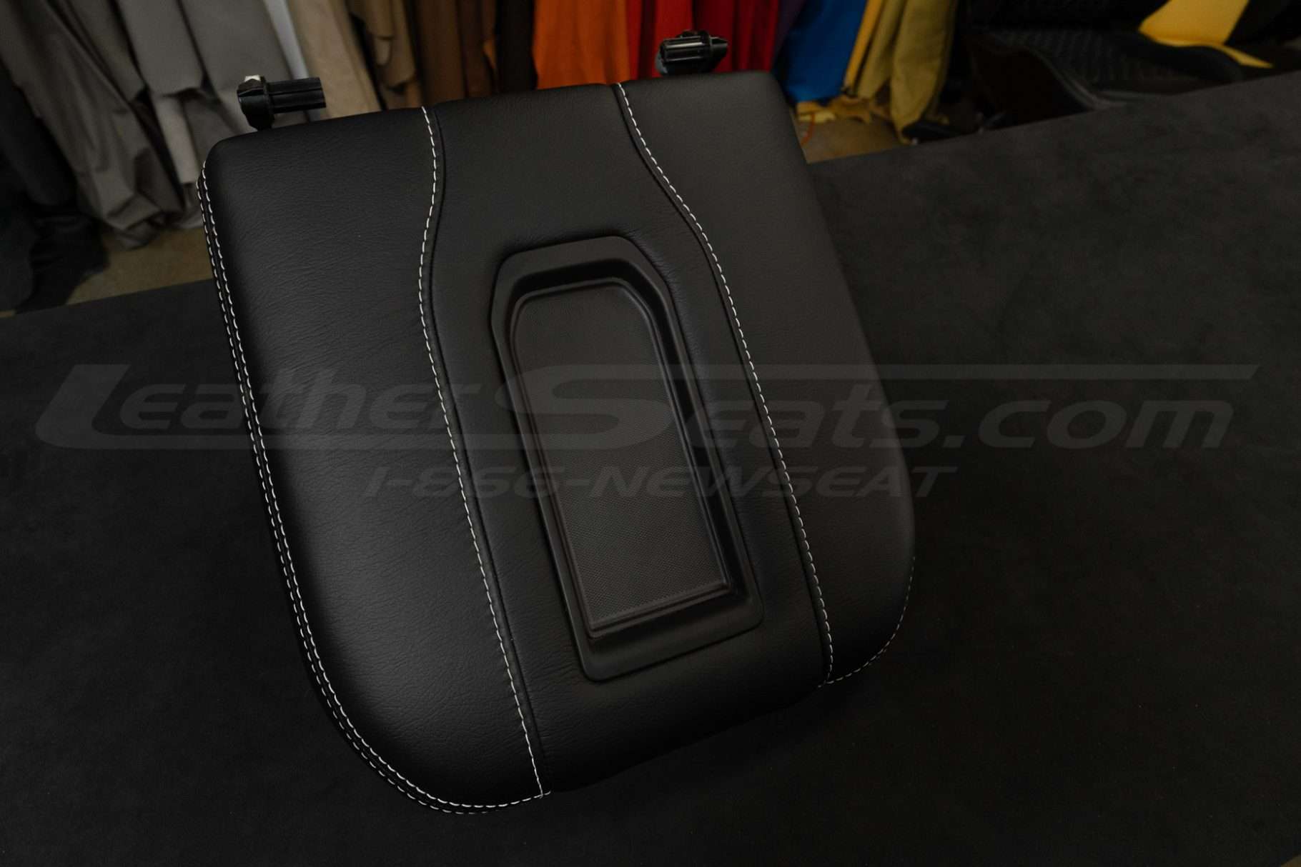 Side view of install leather console lid ocver