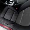 Top-down view of front driver seat showing graphite inserts