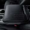 Driver side close-up of installed leather console lid cover