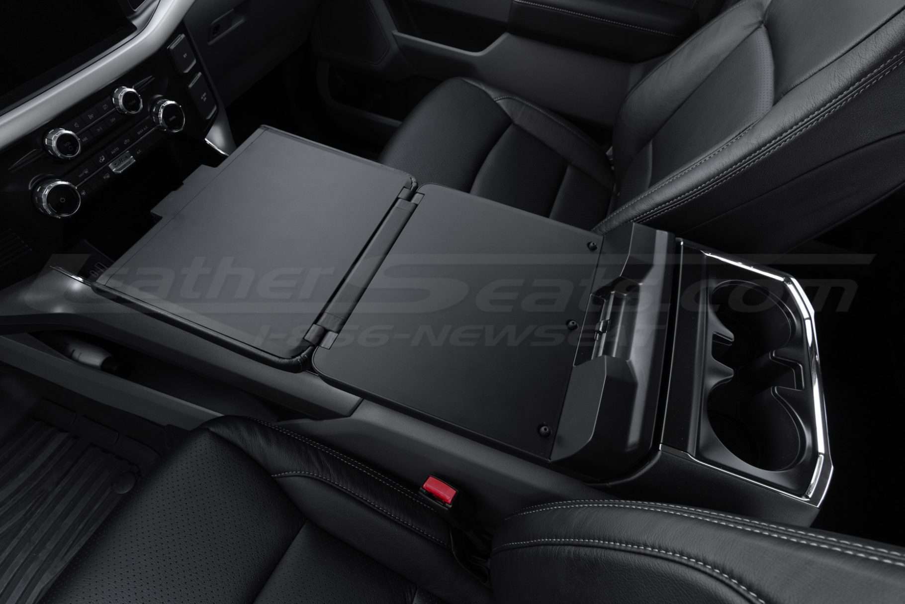 Work surface console flat lay from driver side