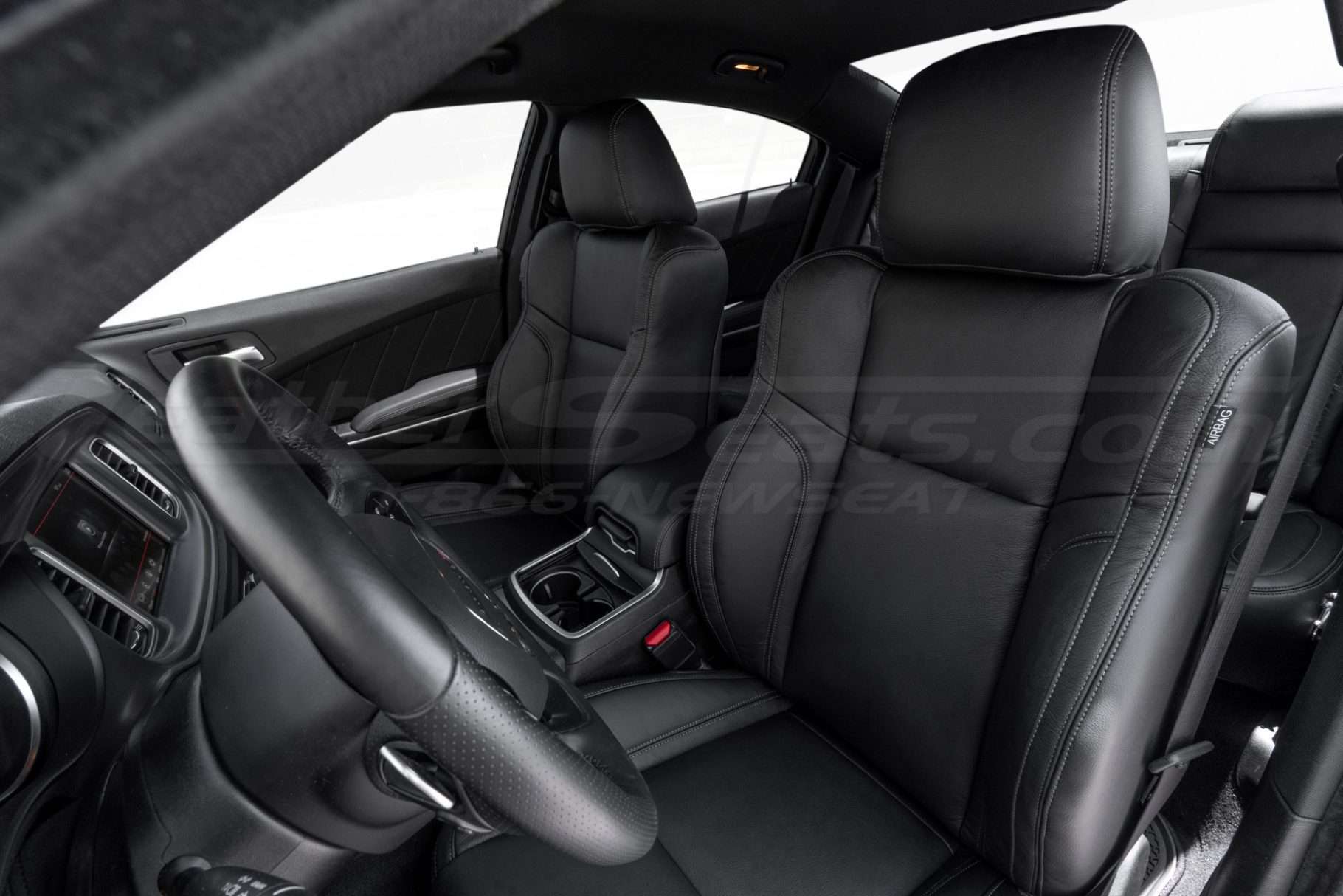 Leather backrest and headrest section of front driver Dodge Charger seat