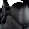 Contrasting Grey stitching on Black leather headrest c;ose-up