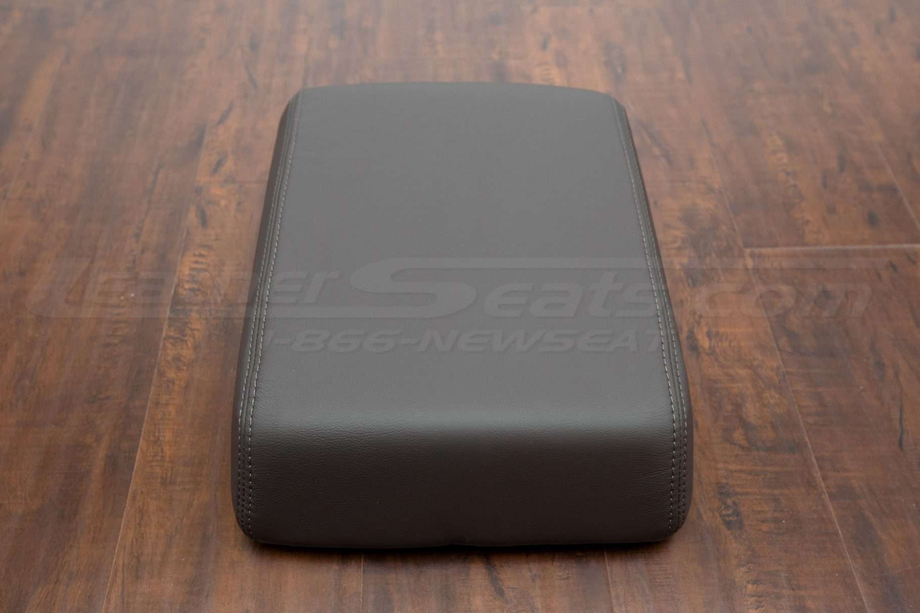 Flat view of lcustom leather console lid cover for 2008-2010 Ford Superduty trucks