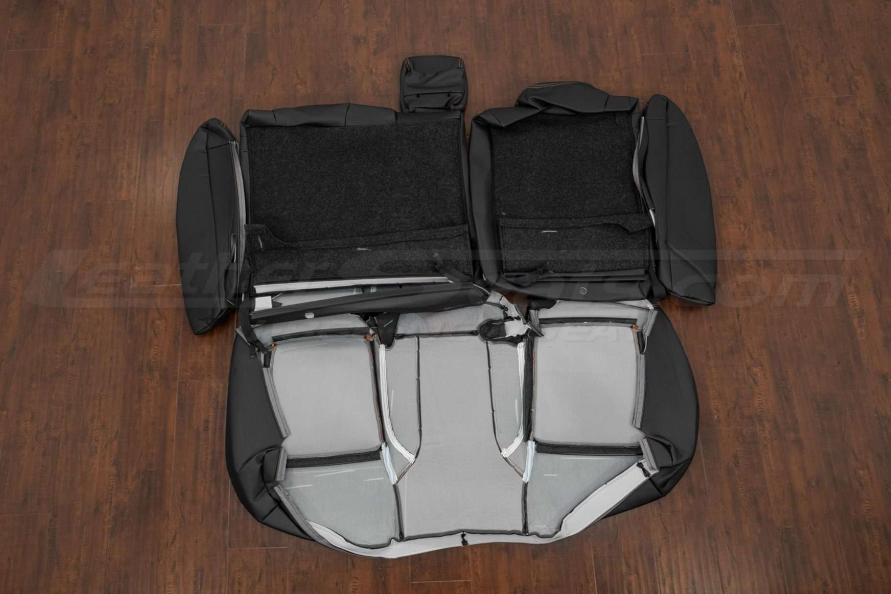 Rear seat upholstery , bolsters and armrest flipped