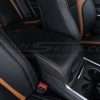 Black leather Dodge Charger console with Orange stitching