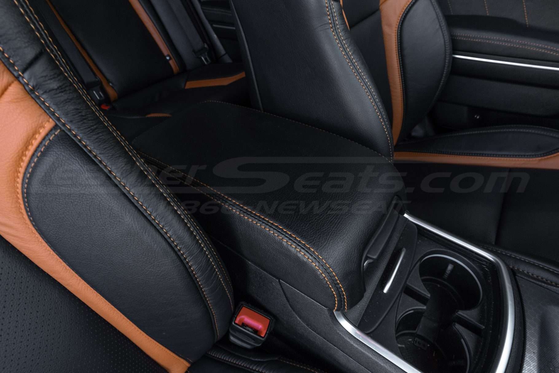 Black leather Dodge Charger console with Orange stitching
