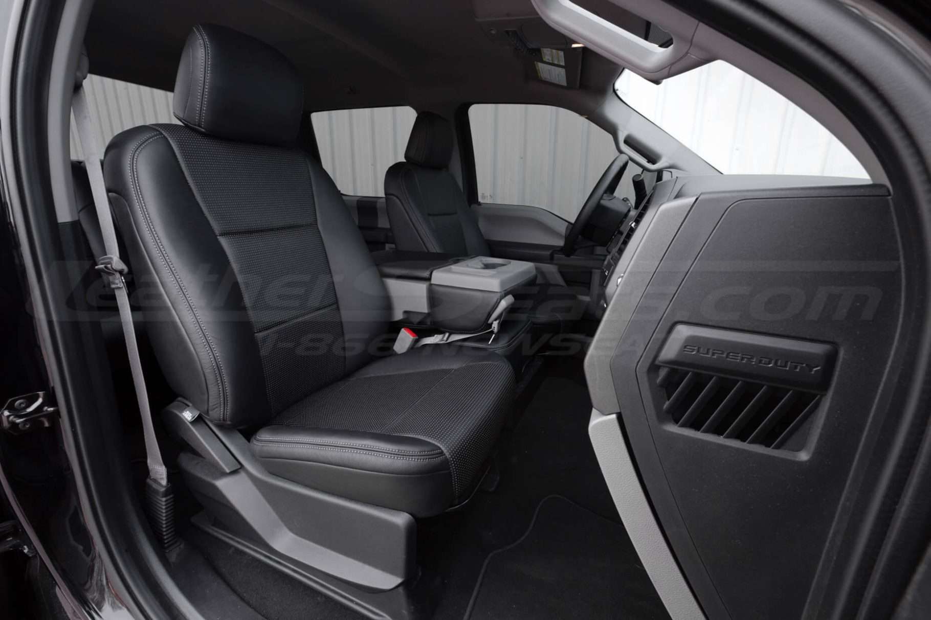 Ford SuperDuty Aftermarket leather seats in Black and Piazza Hrey Perforation - Front passenger seat