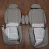 Back view of front seat upholstery and armrests