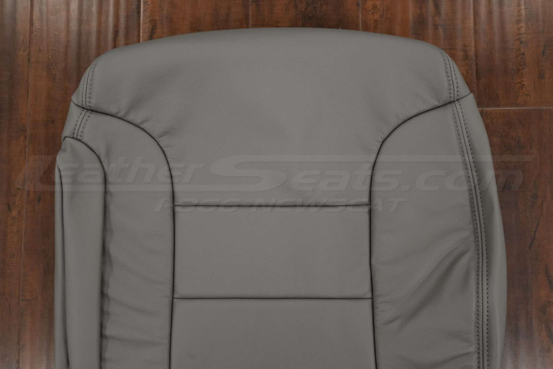 Upper section of GMC Yukon leather backrest upholstery