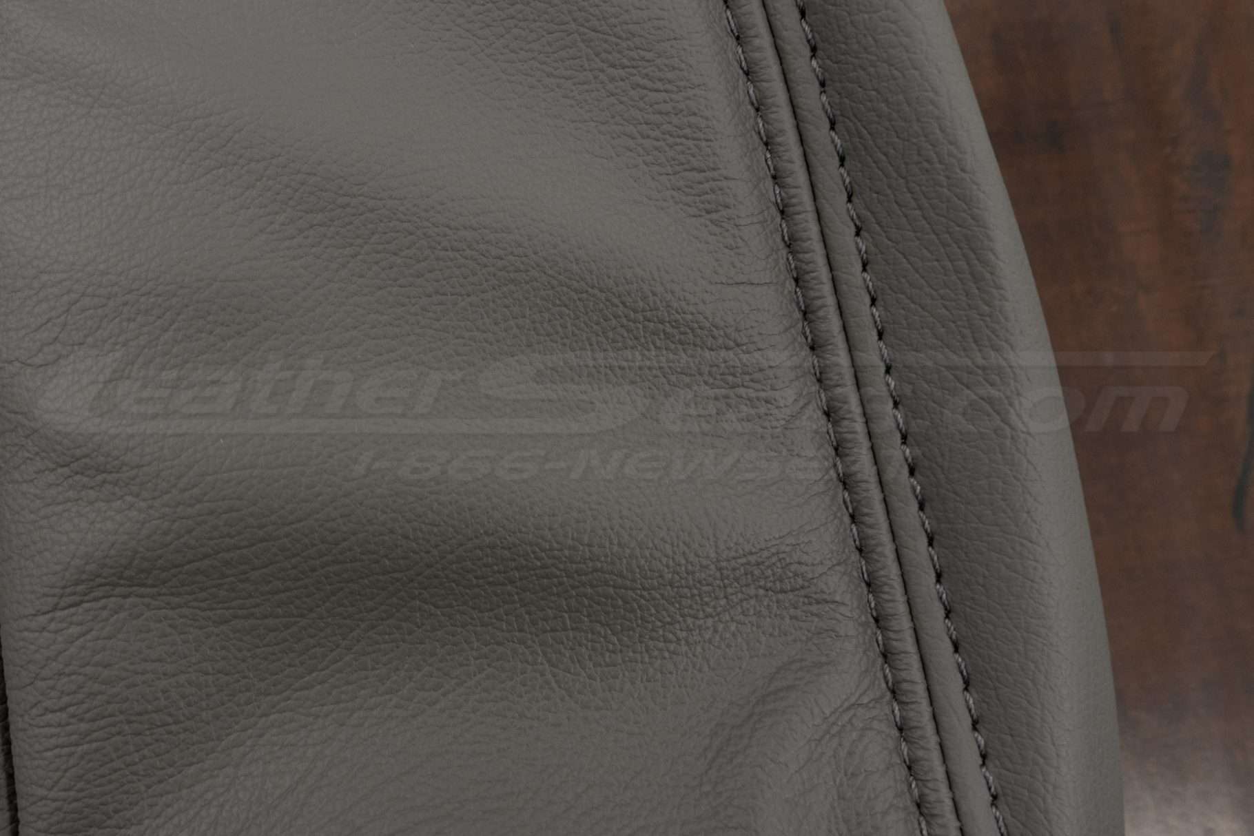Matching smoke stitching on smoke leather