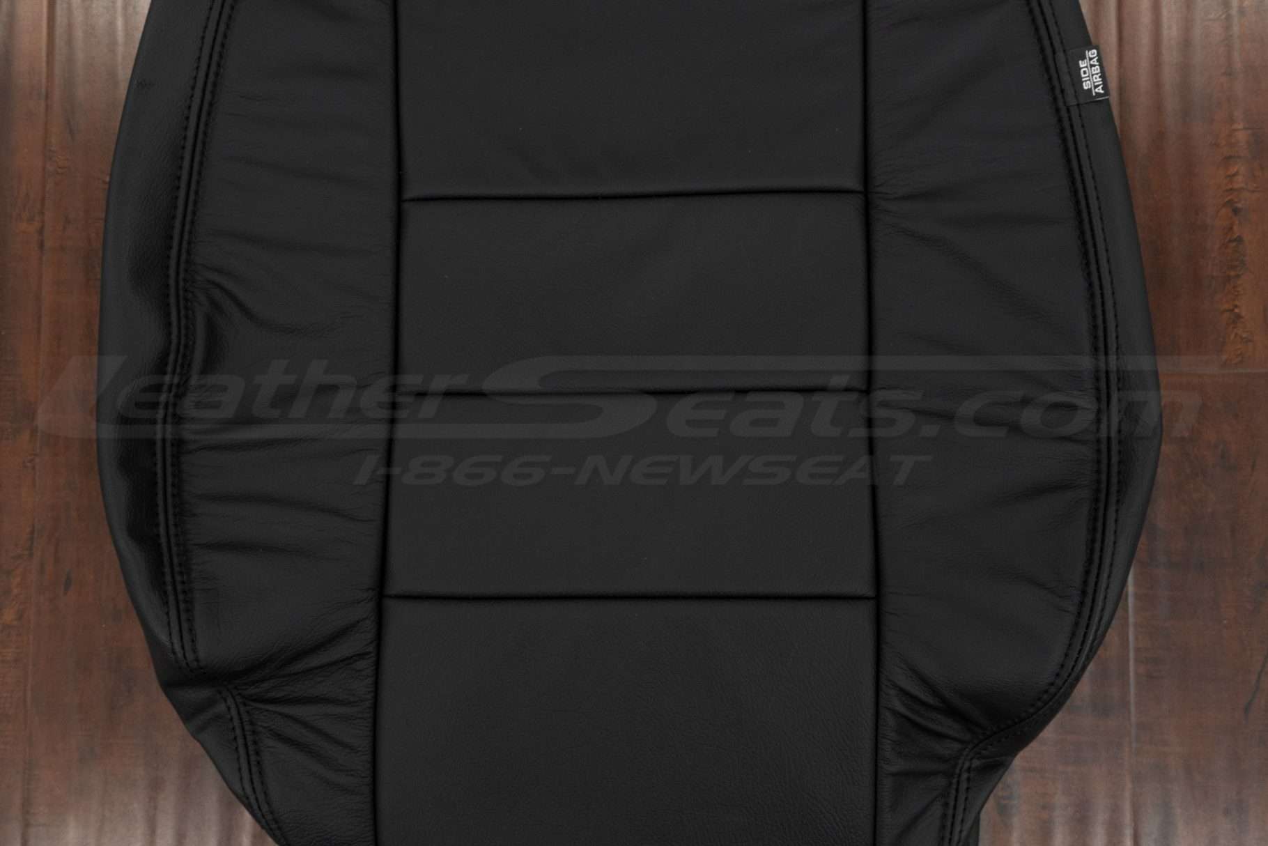 Insert section of black leather backrest