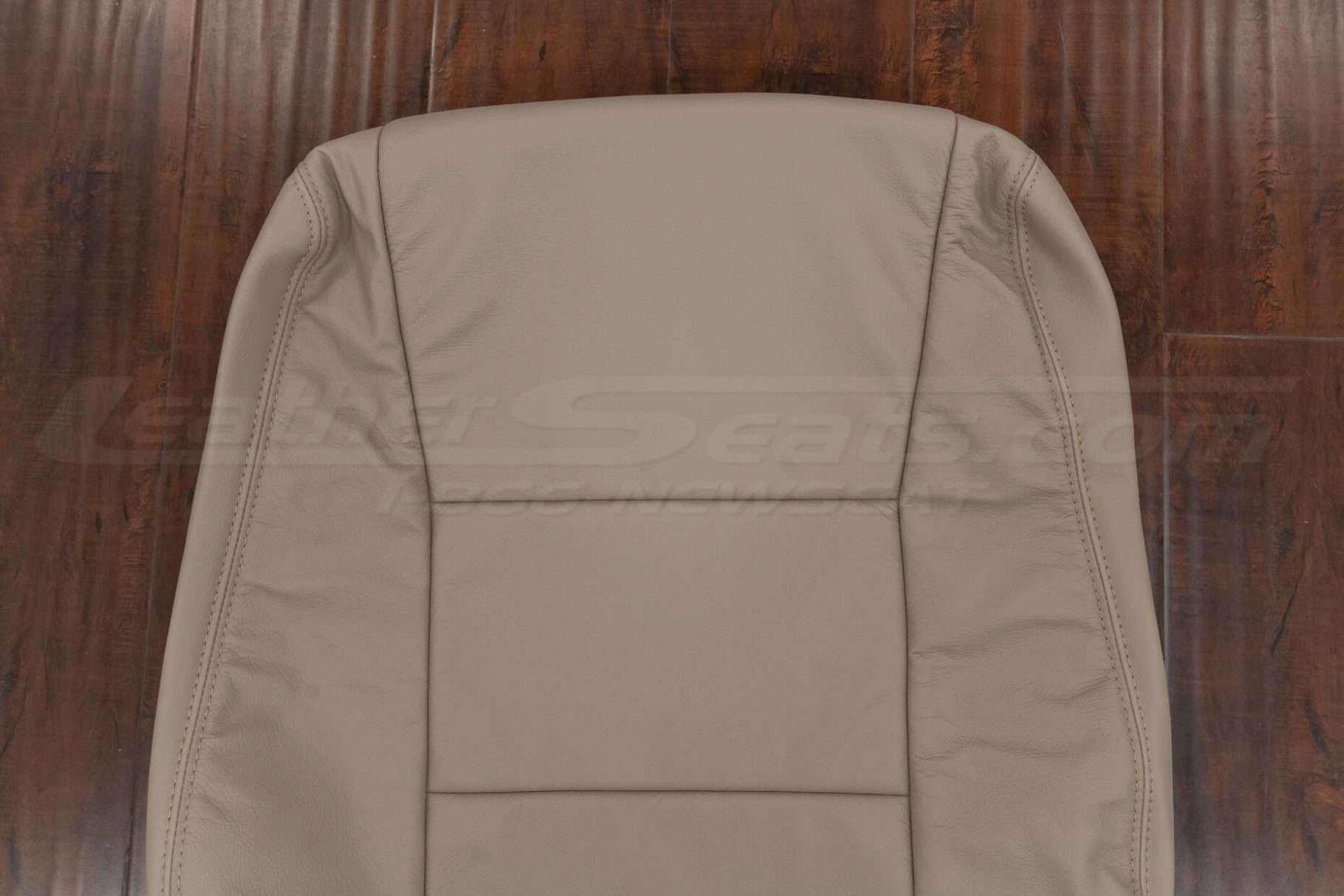 Upper section of front backrest upholstery