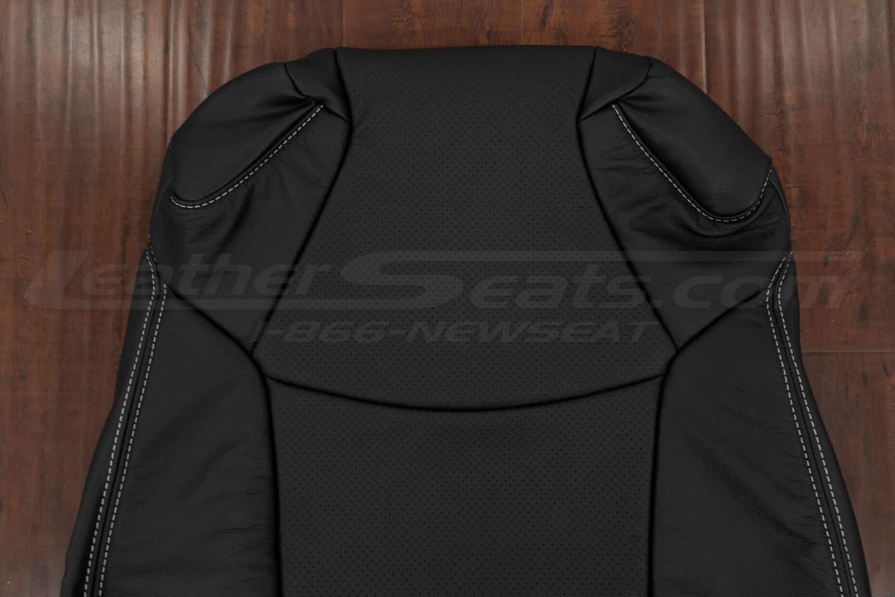 Upper section of leather backrest with perforated body