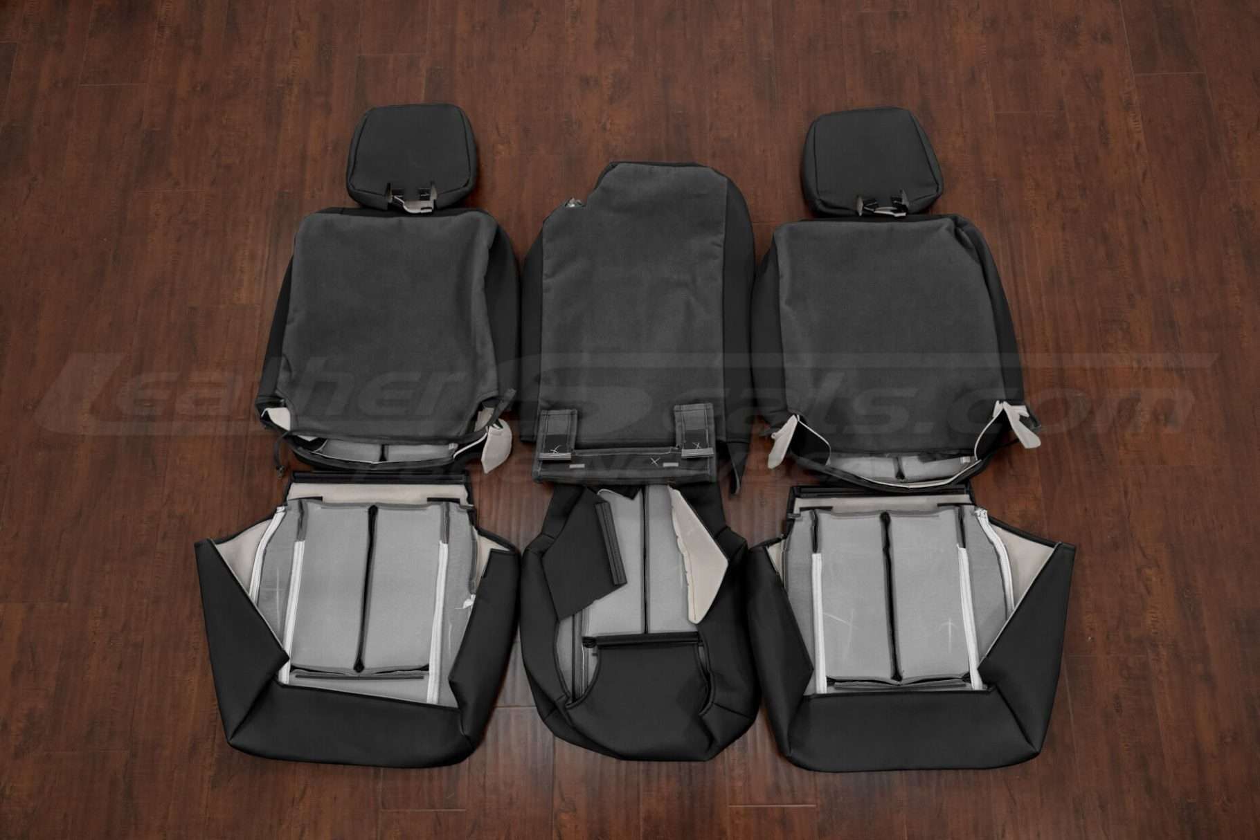 Ford Expedition aftermarket leather kit in black - back view of middle row upholstery