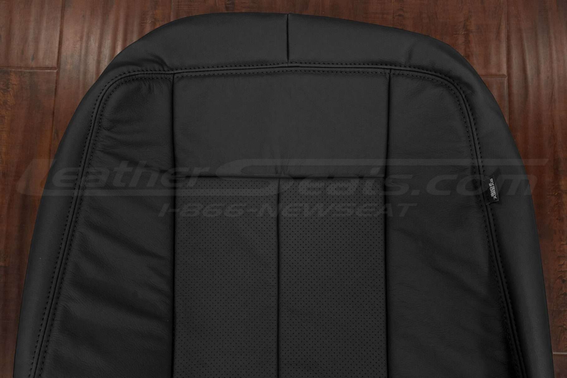 Upper section of leather backrest