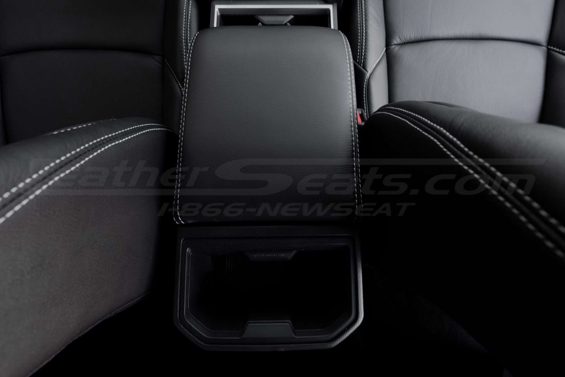 Back-to-front view of installed Toyota Tacoma console lid cover