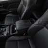 Drive side wide view of Toyota Tacoma leather console lid cover installed