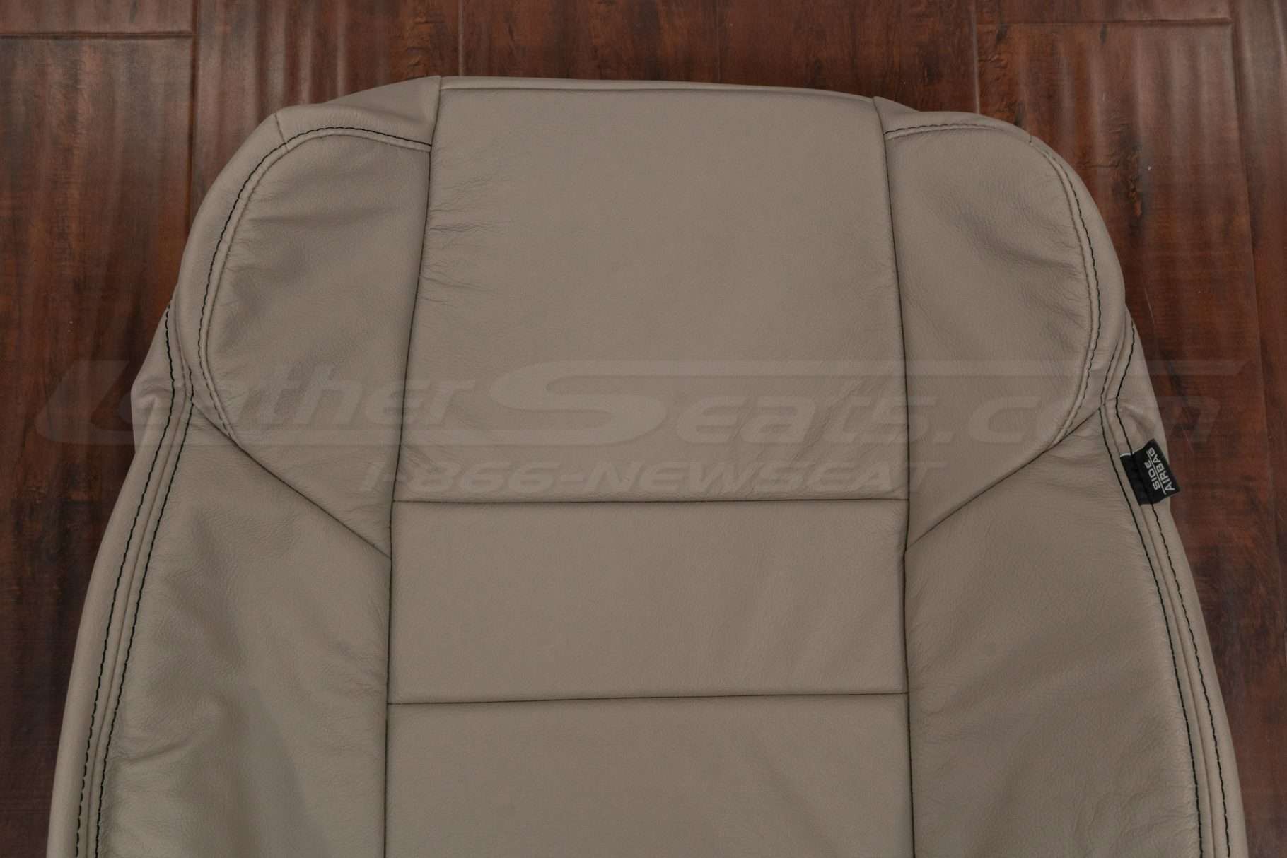 Upper section of leather backrest upholstery