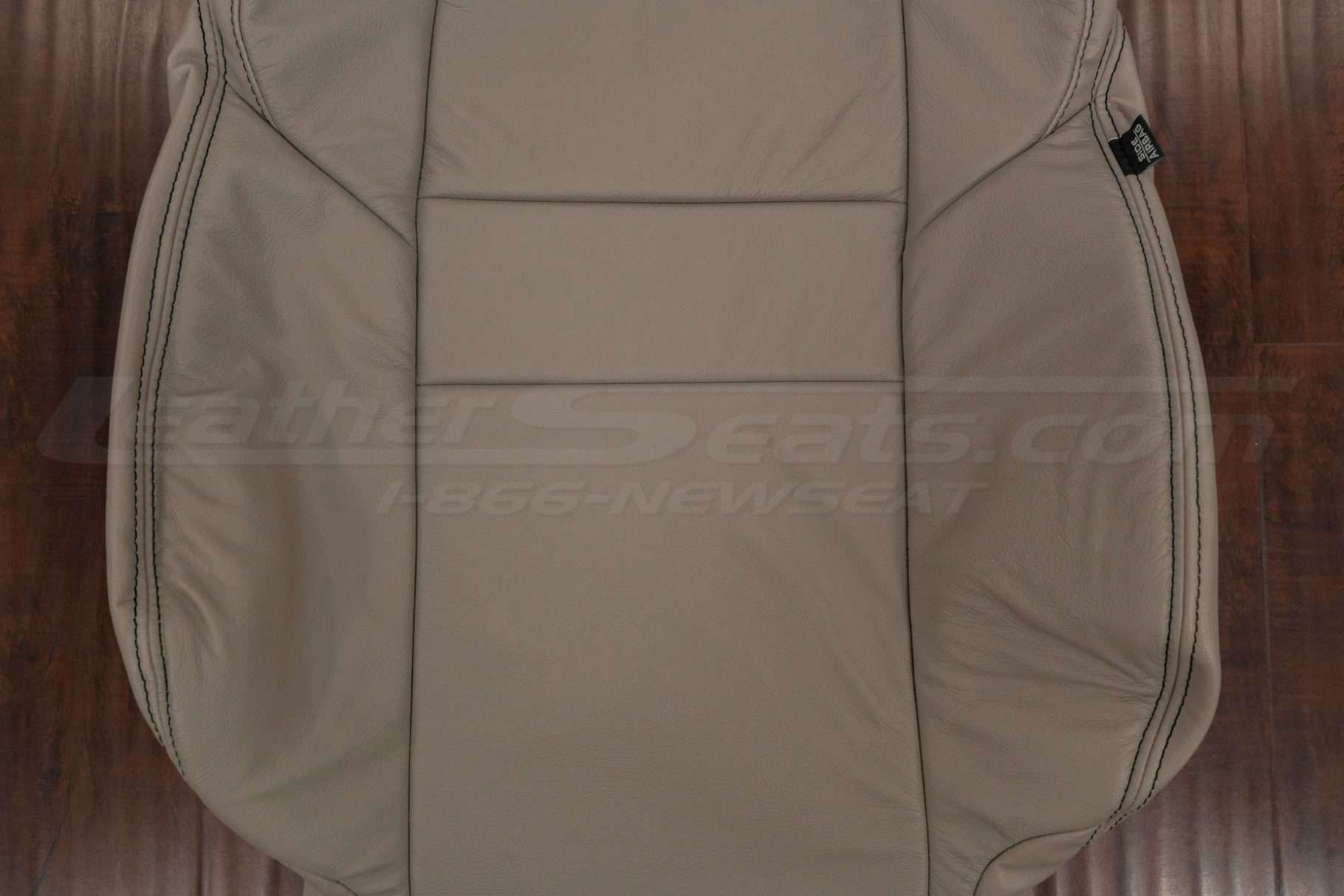 Lower insert section of leather backrest upholstery