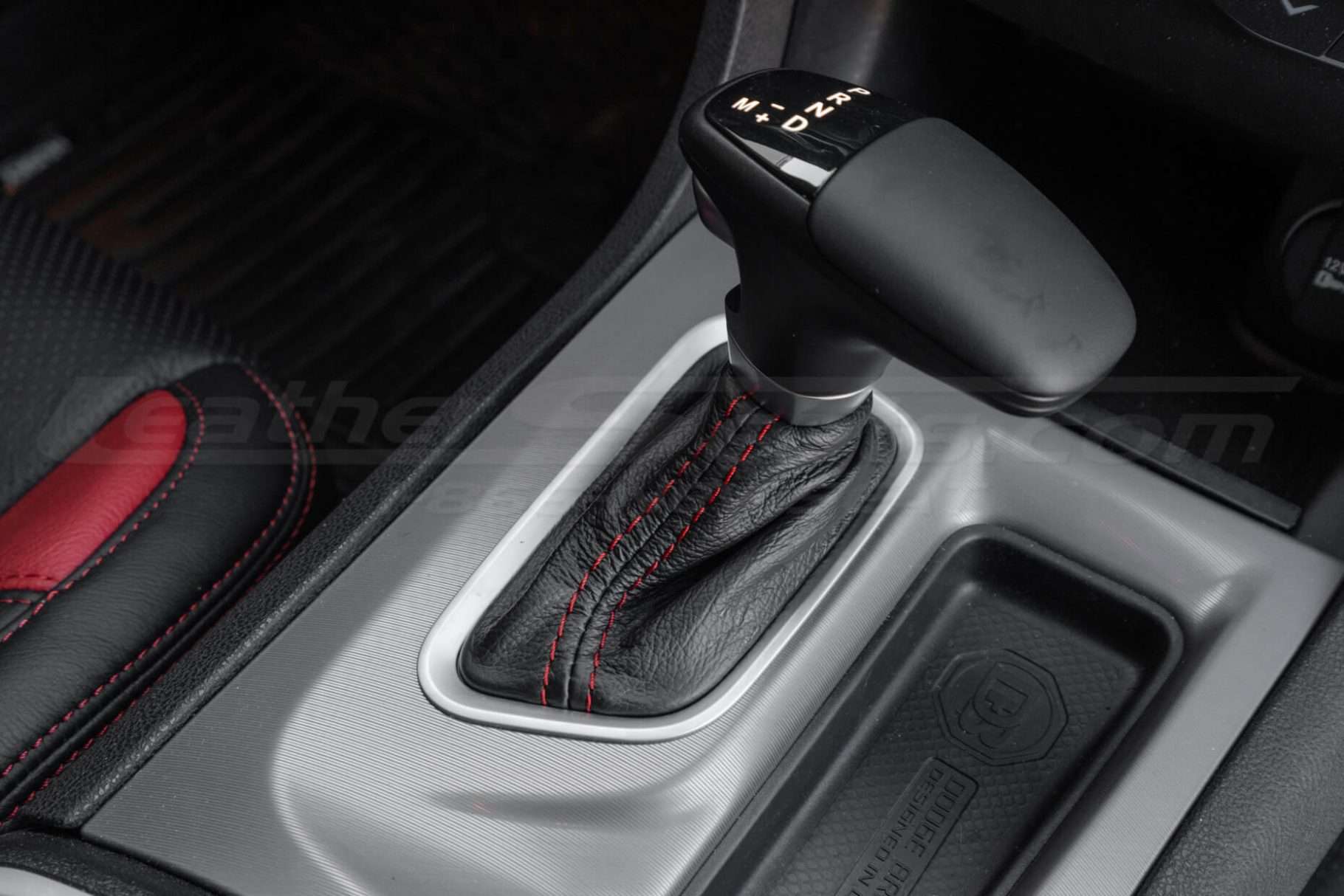 Black leather automatic shift boot with contrasting red stitching