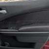 Front passenger door of Dodge Charger with leather door inserts and armrests in black leather with red stitching