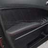 Dodge Charger Installed custom door armrest with black leather and red stitching