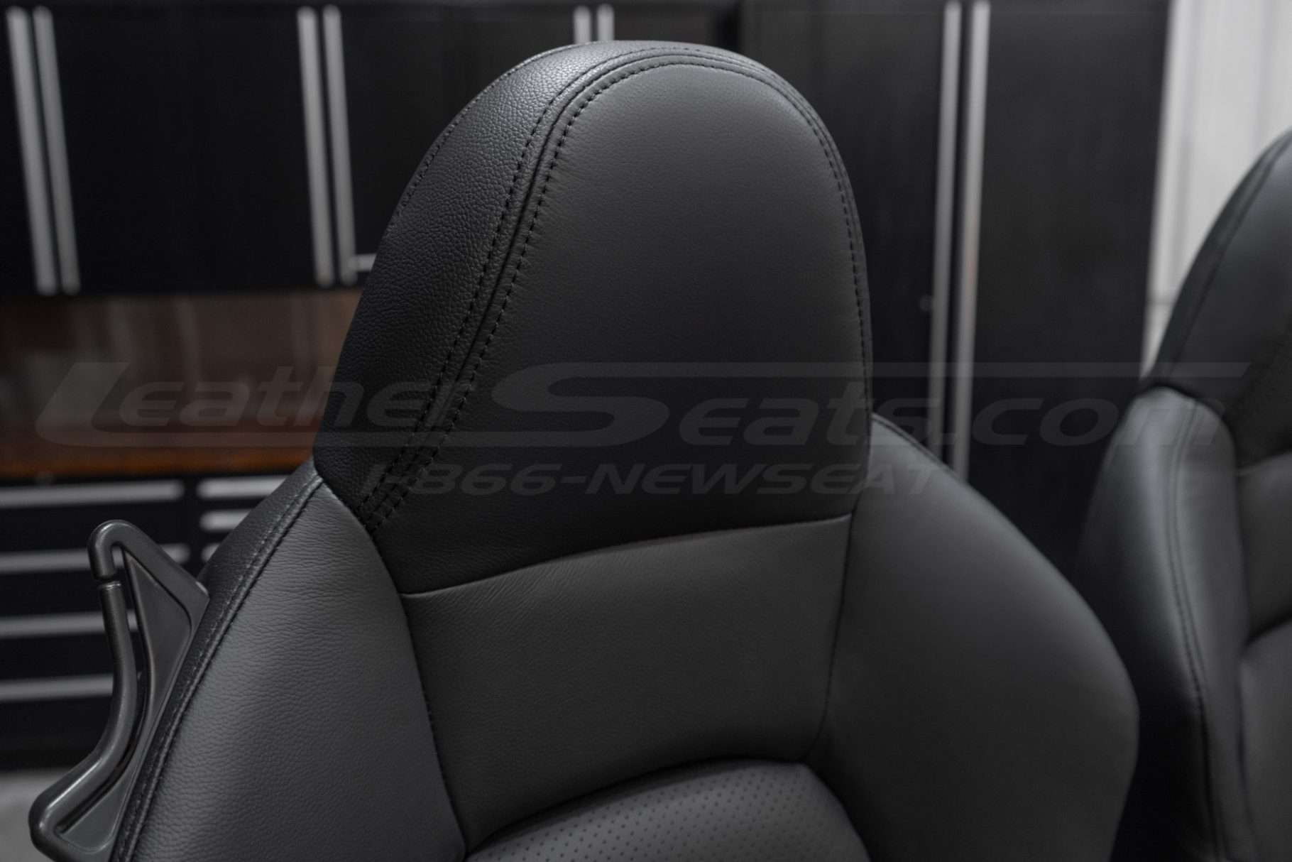Honda S2000 installed black leather upholstery kit - Headrest close-up