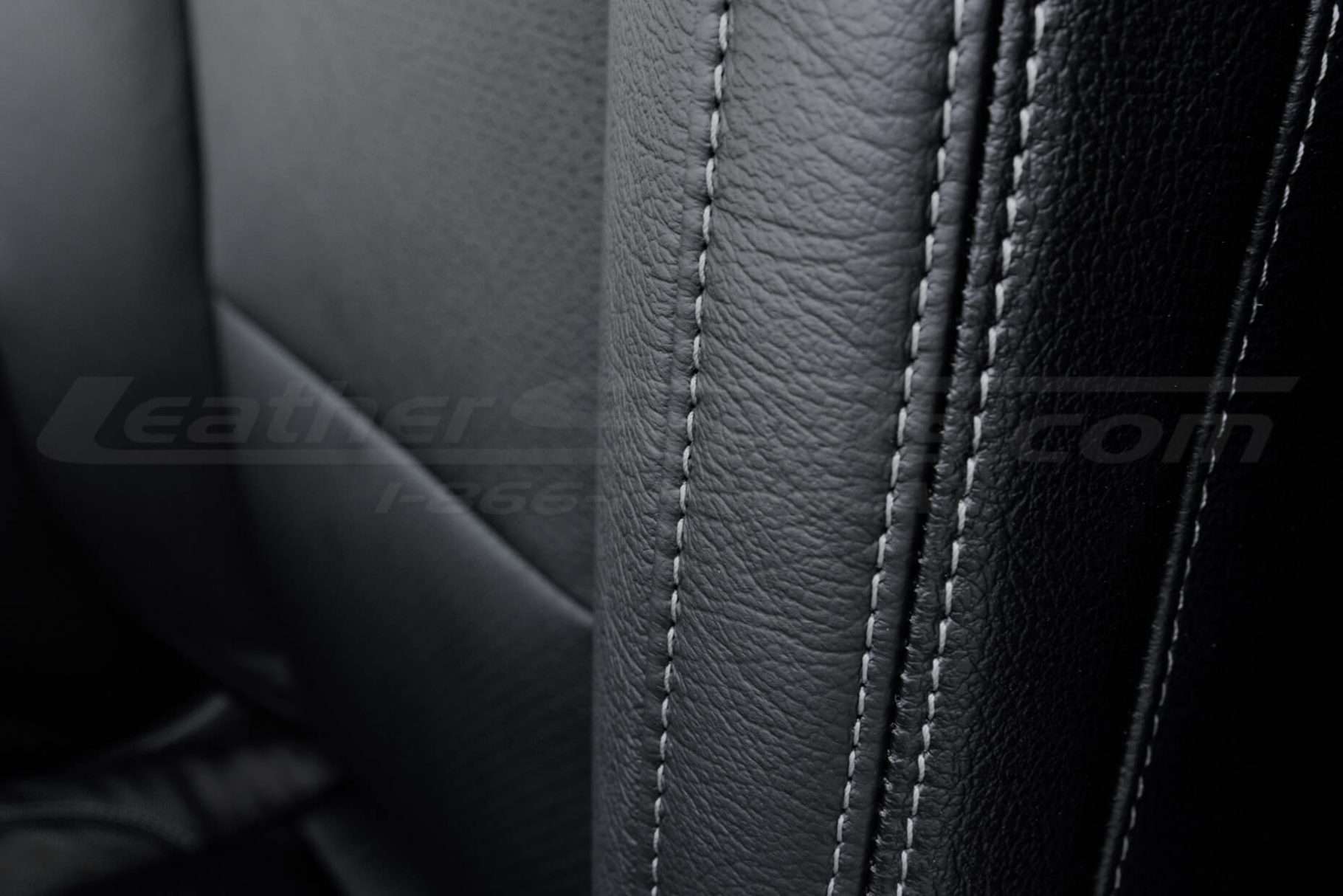 Contrasting double-stitching on Lapis on Black leather