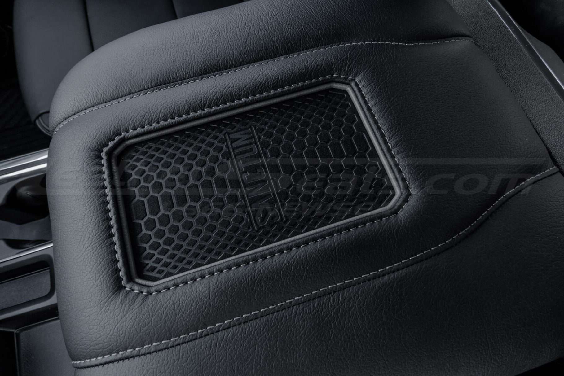 Close-up of qi2 wireless charging center console pad