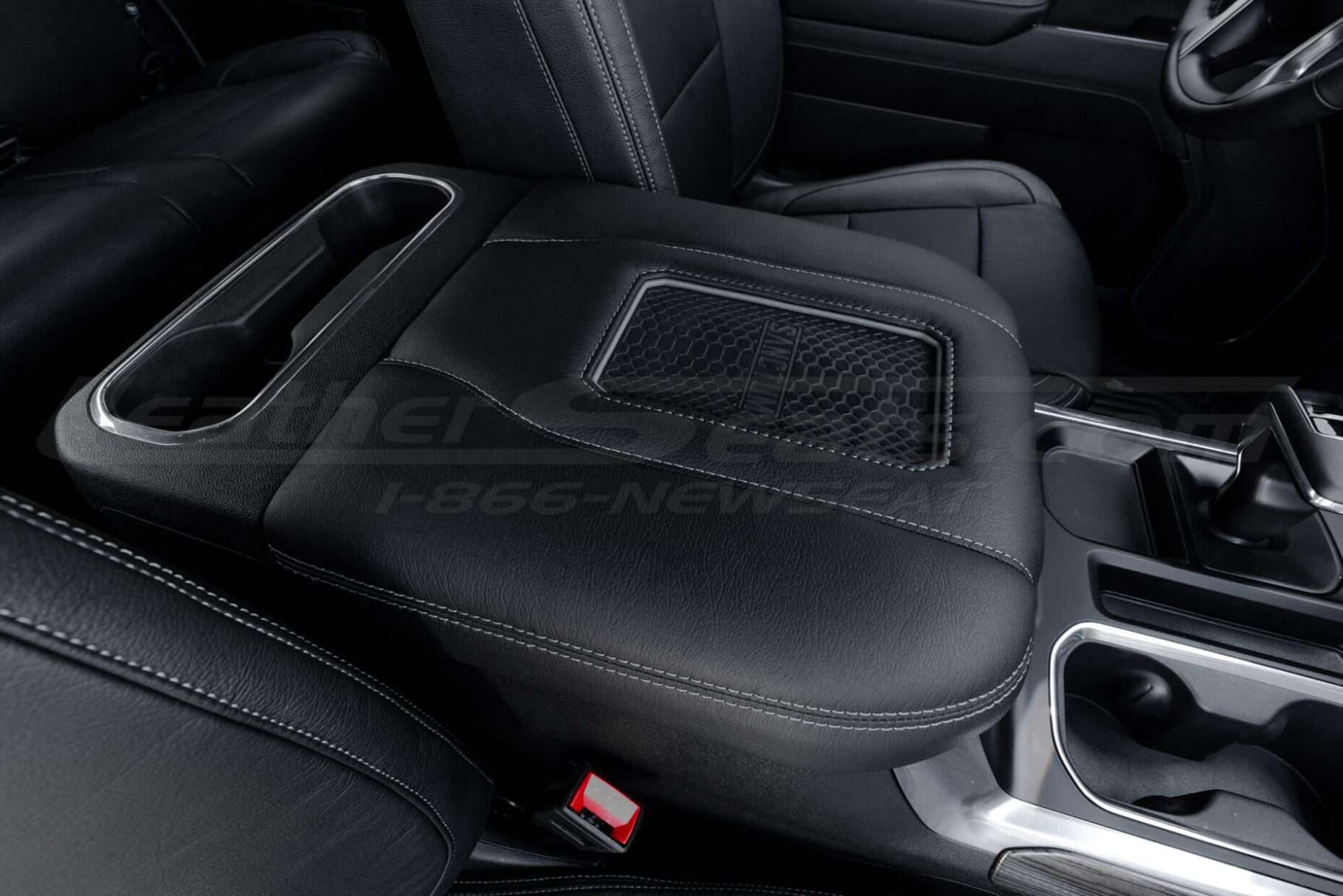 Passenger close-up of Sanctum Wireless Phone Charging Console