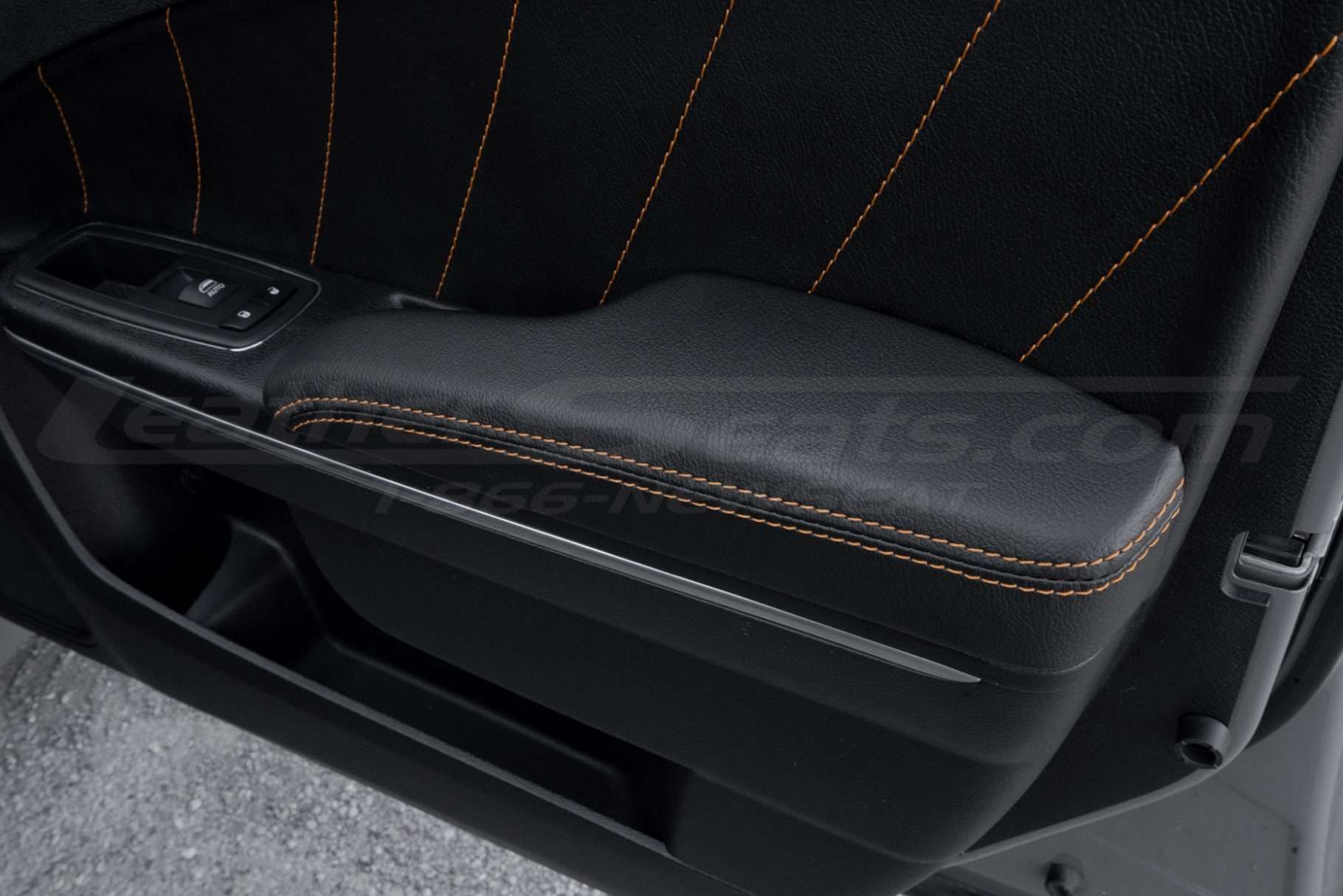 Front passenger door with installed door armres and insert covers