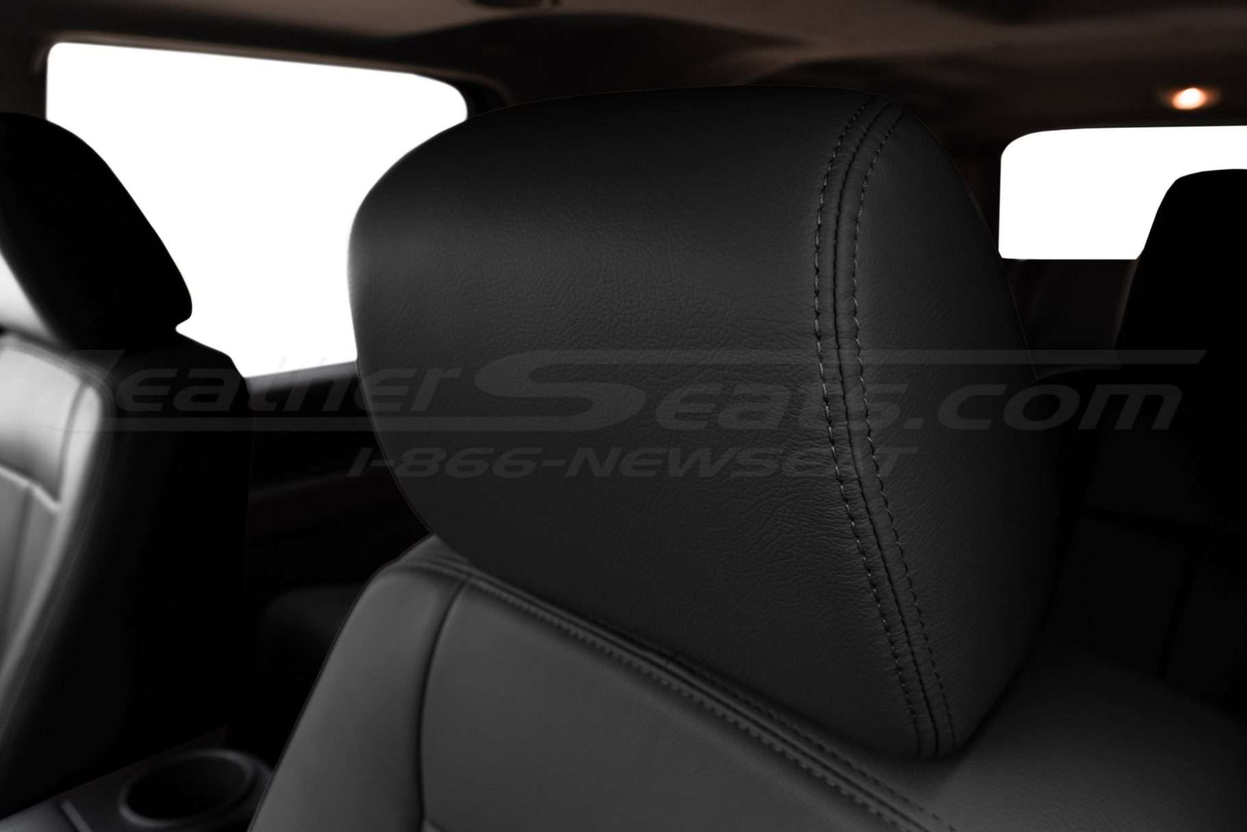 Dark Graphite installed leather headrest for Ford Expedition