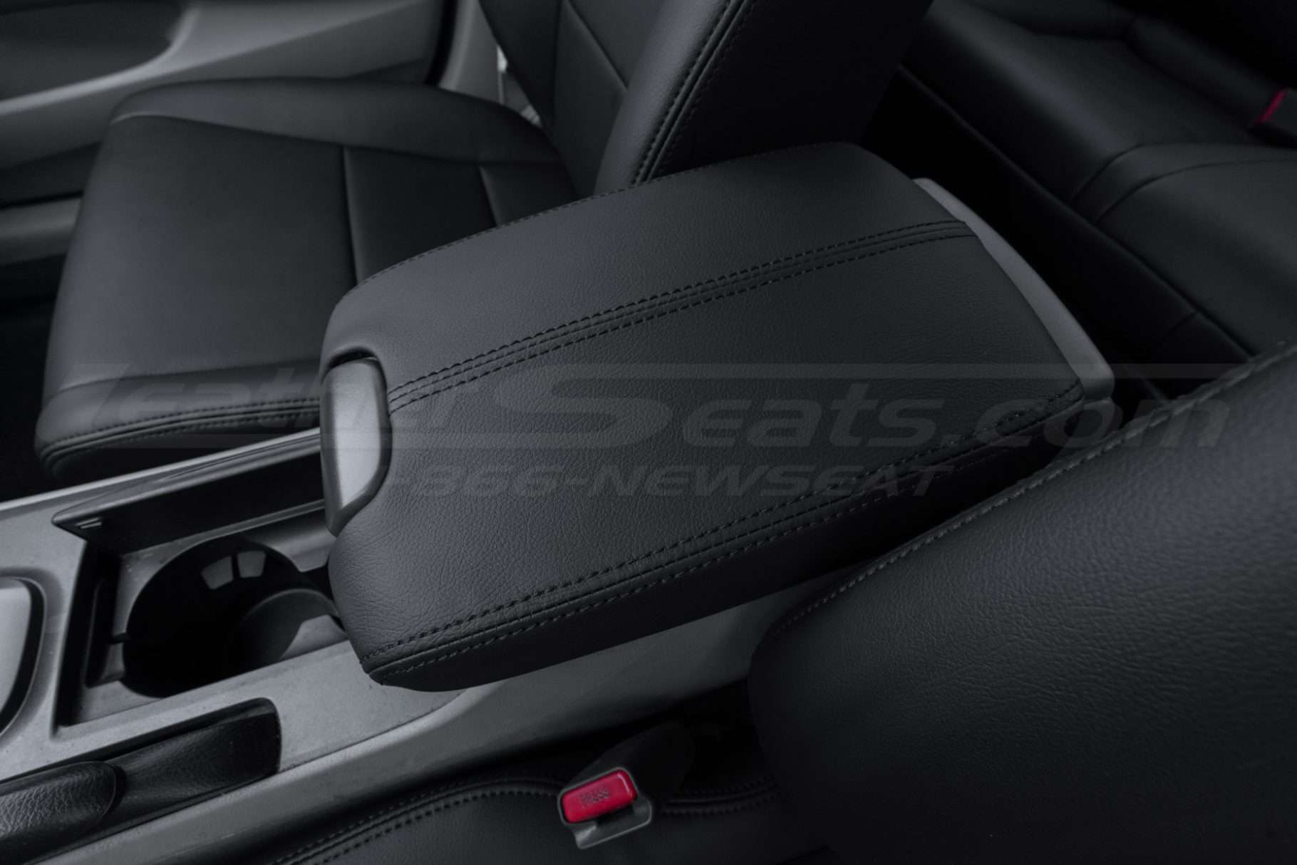 Close up on installed black leather console lid for honda accord coupe and sedan