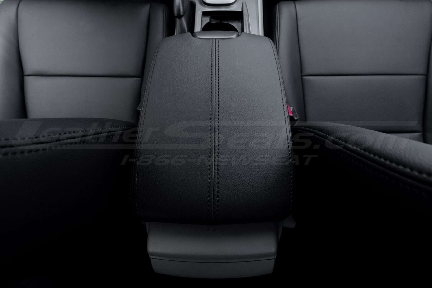 Top-down rear seat view of honda accord console lid upholstery