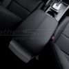 Back passenger view of black installed leather console cover