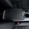 Top-down view from passenger side of leather console lid with matching stitching