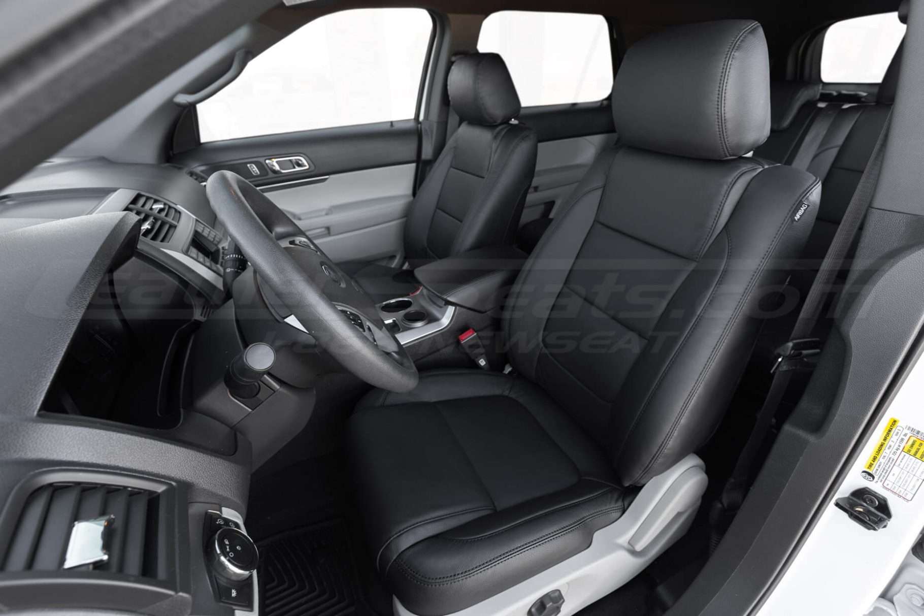 2013 front driver side with installed black leather seats