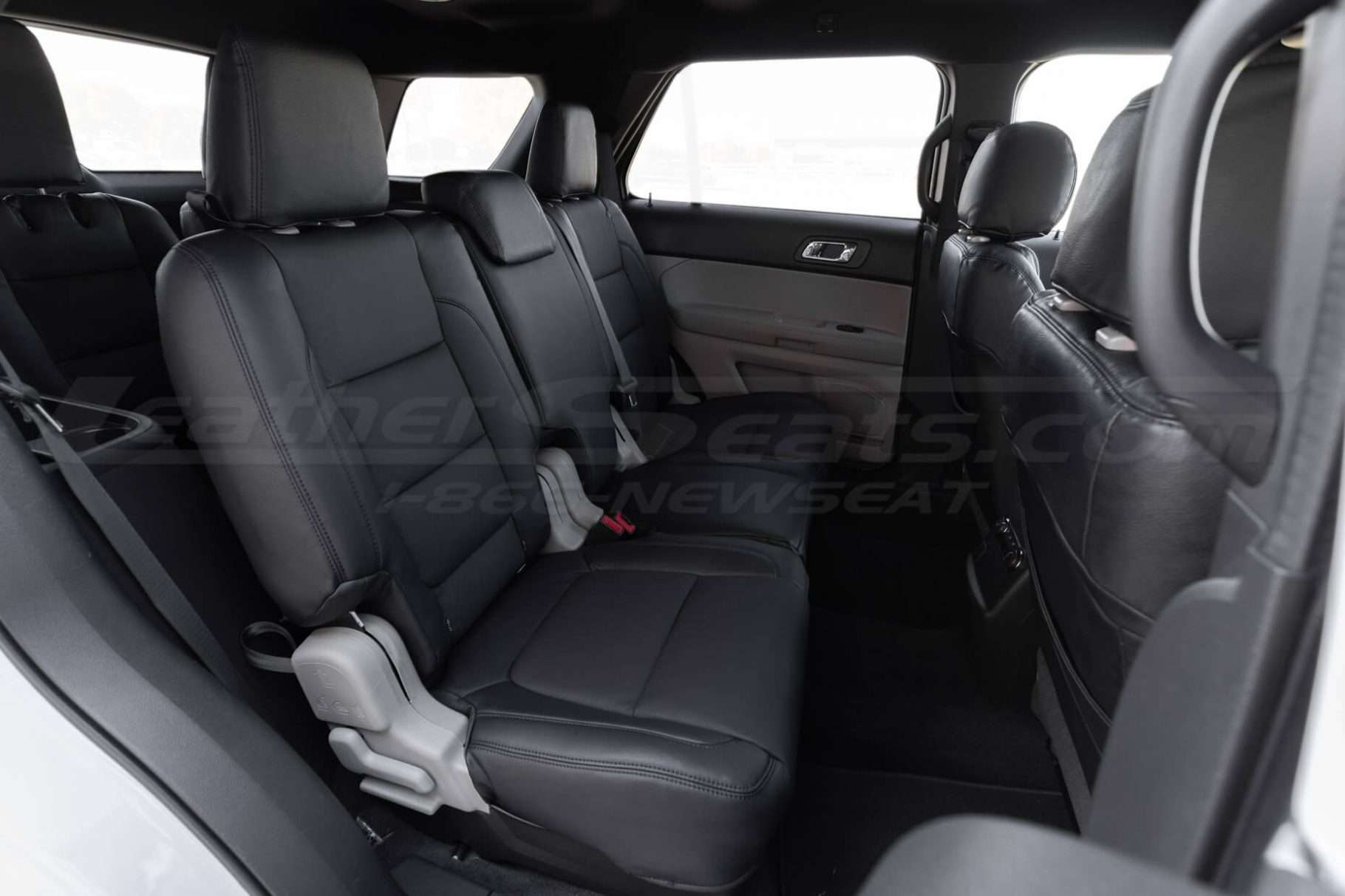 Passenger view of installed black upholstery for Ford Explorer middle row