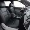 Front passenger seat with black isntalled aftermarket leather kit