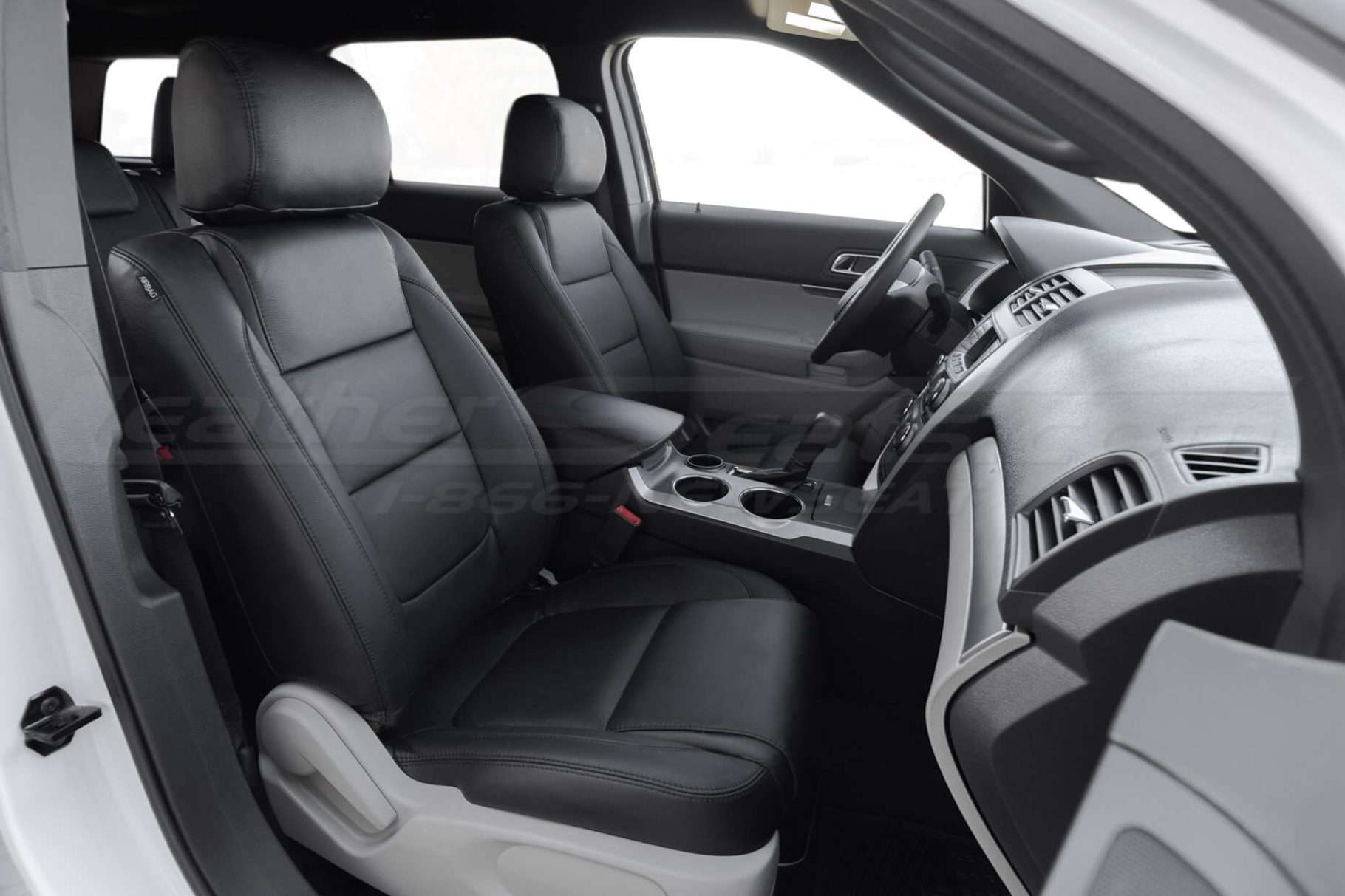 Front passenger seat with black isntalled aftermarket leather kit