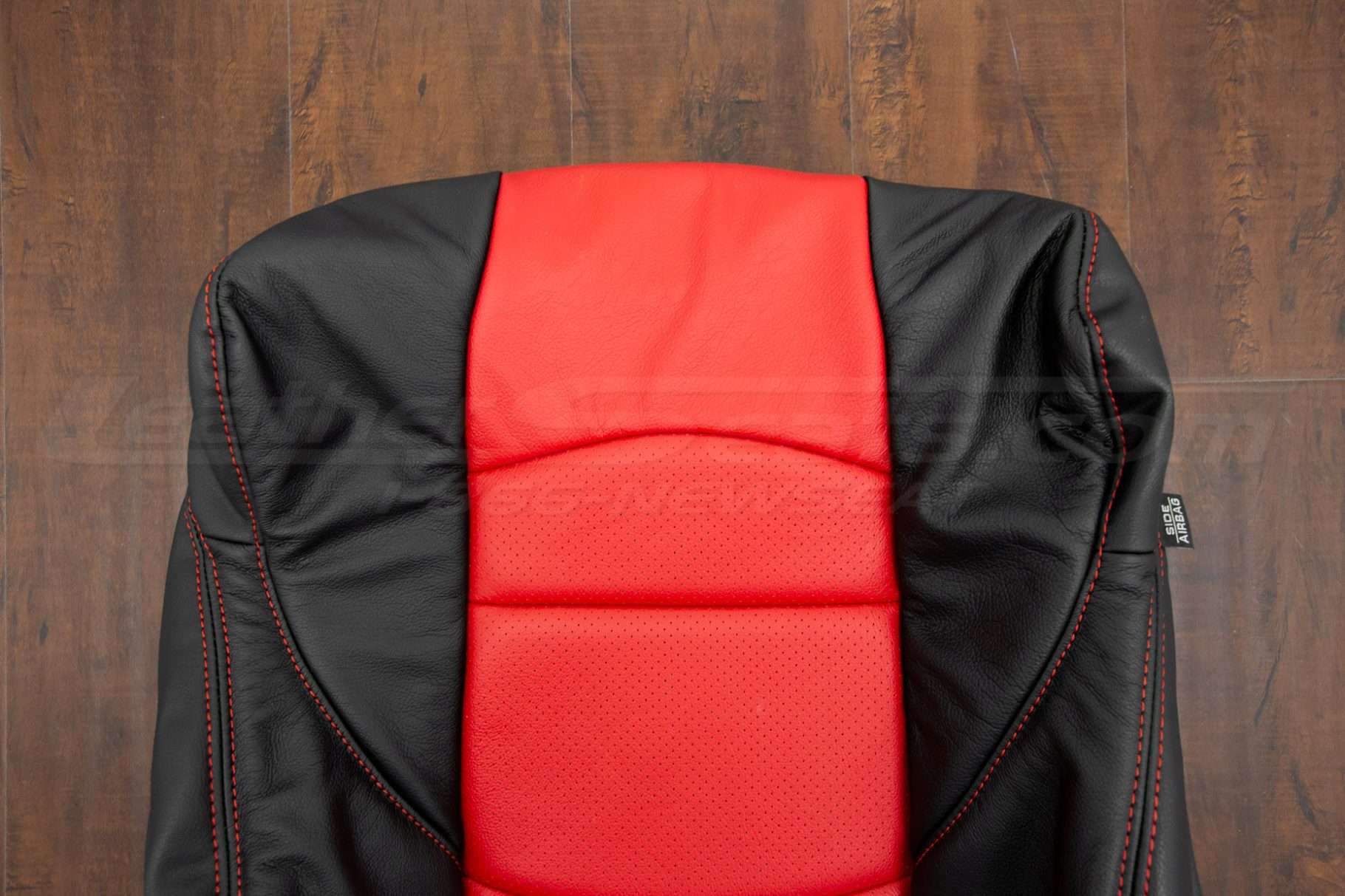 Upper section of two-tone nissan 370z leather backrest