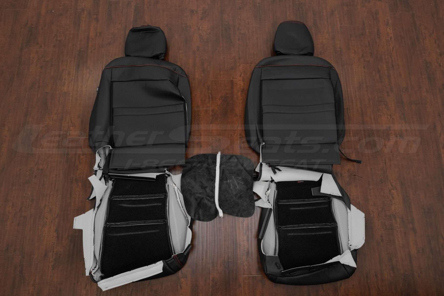 Front seat leather upholstery and console cover flipped