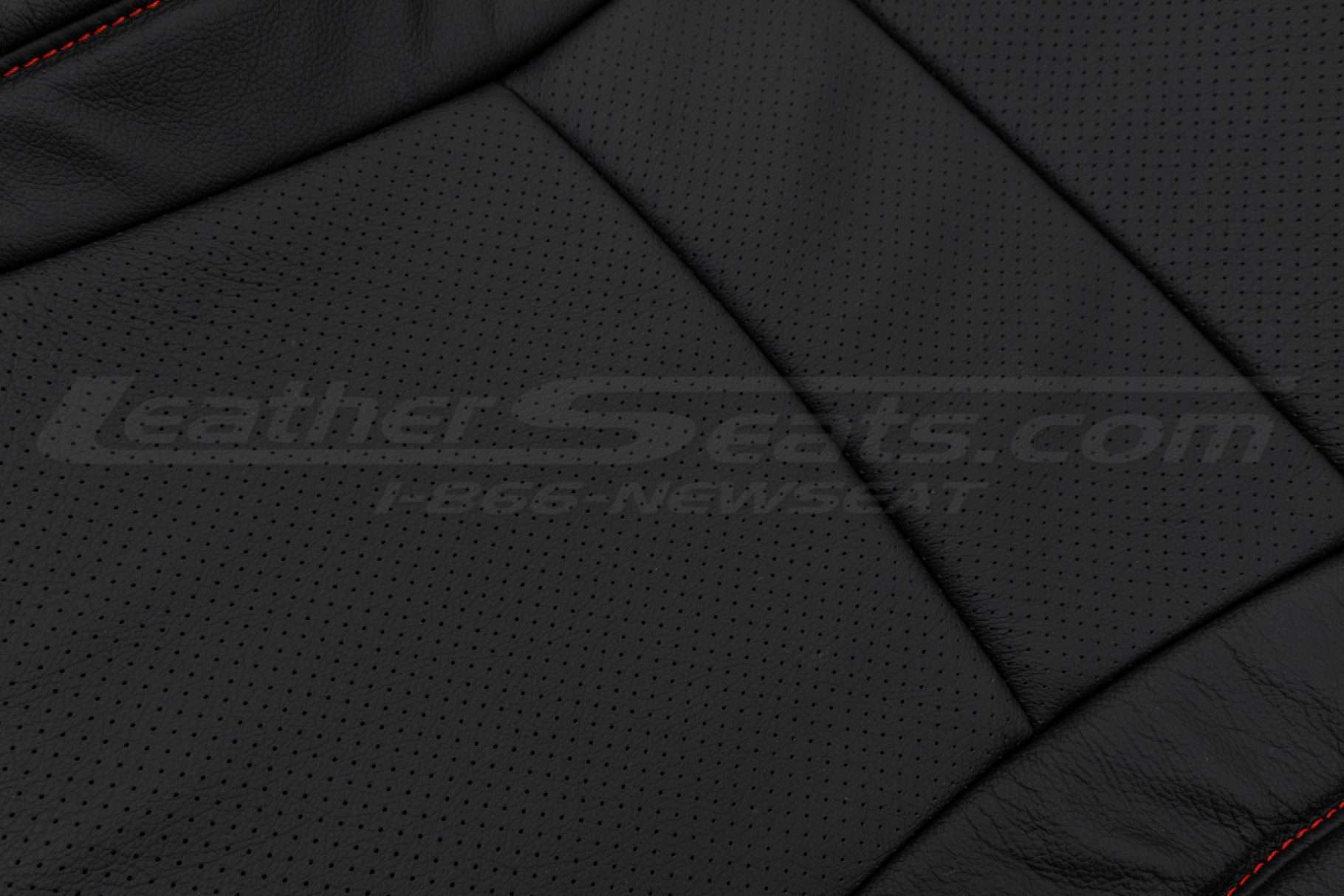 Black leather body perforation close-up